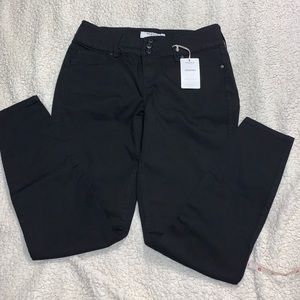 Black 3-button jeggings.